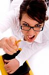 High Angle View Of Shouting Female Pointing With Pencil Stock Photo