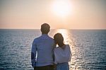 Hipster Photography Style Of Younger Love Couples Vacation Relaxing With Sun Set Sky At Destination Sea Side Happiness Emotion Stock Photo