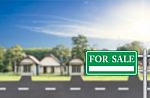 Home For Sale With Green For Sale Sign Stock Photo