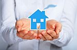 House In Hands Stock Photo