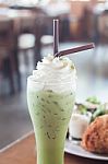 Iced Green Tea With Whipped Cream Stock Photo