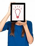 Idea Concept Lightbulb In A Tablet Computer Stock Photo
