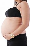 Image Of Pregnant Woman Touching Her Belly With Hands Stock Photo
