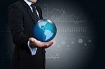 Investor With Globe Stock Photo