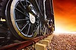 Iron Wheels Of Stream Engine Locomotive Train On Railways Track Stock Photo