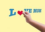 Isolated Child Or Kid Hand Hold Red Heard Form Filling To Blue T Stock Photo