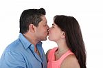 Isolated Young Casual Couple Kissing Stock Photo
