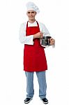 Isolated Young Male Chef Posing Stock Photo