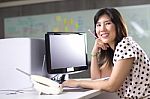 It Girl Sitting Infront Of Computer Stock Photo