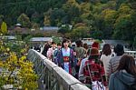 Japanese Girl On Togetsukyo Bridge, Arashiyama Stock Photo