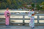 Japanese Girls Taking Photo At Togetsukyo Bridge Stock Photo