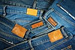 Jeans With Brown Leather Labels Background Stock Photo