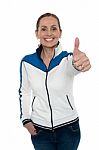 Joyous Woman Showing Thumbs Up Gesture Stock Photo