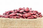 Kidney  Beans In Sacks Fodder On White Background Stock Photo