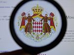 Kiev, Ukraine - March 23, 2019: Monaco Coat Of Arms Viewed Throu Stock Photo