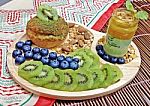 Kiwi Fruit And Blueberries Chou Cream With Green Tea Custard Pudding Stock Photo