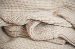 Knit Brown Yarn Ruffle Wrinkle Texture Stock Photo