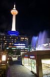 Kyoto Tower With Colorful Fountain Show Stock Photo