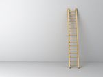 Ladder On Empty Wall Stock Photo