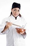 Lady Chef Holding Chopstick And Pot Stock Photo