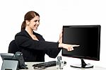 Lady Pointing On Blank Computer Screen Stock Photo