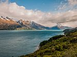 Lake With Snow Caped Mountains Stock Photo