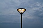 Lamp Post With Stormy Sky Stock Photo