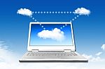 Laptop On The Cloud Stock Photo