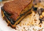 Leftover Cake With Chocolate Cream And Crumbs Stock Photo