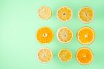Lemon And Orange Slices On The  Light Blue Background Top View Stock Photo