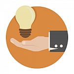 Light Bulb In Hand Stock Photo