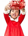 Little Girl Dressed As Santa Claus Stock Photo