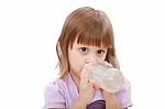 Little Girl Drinking Water Stock Photo