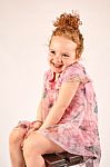 Little Girl Fashion Model In Rose Dress Stock Photo