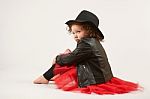 Little Girl Fashion Model With Black Hat Stock Photo