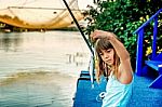 Little Girl Fishing On The River Bojana In Montenegro Stock Photo