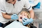 Little Girl On Dental Check Up Stock Photo