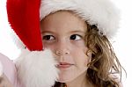 Little Girl Wearing Christmas Hat Stock Photo
