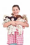 Little Girl With Dolls Stock Photo