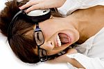 Lying Lady Shouting With Headset Stock Photo