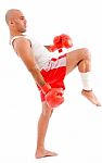 male Boxer In Kicking Pose Stock Photo