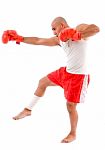 Male Boxer In Pose To Punch Hard Stock Photo