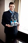 Male Butler Holding Beverages Stock Photo