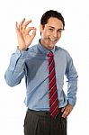 Male Executive Gesturing Ok Stock Photo