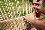 Male Hands Braiding Wicker Basket Stock Photo