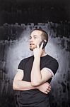 Male Talking Over Phone Stock Photo