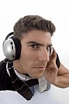 Male With Headphone And Looking At Camera Stock Photo