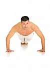 Man Doing Push Ups Stock Photo