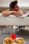 Man Having Breakfast In Bed Stock Photo