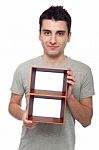 Man Holding Frame Stock Photo